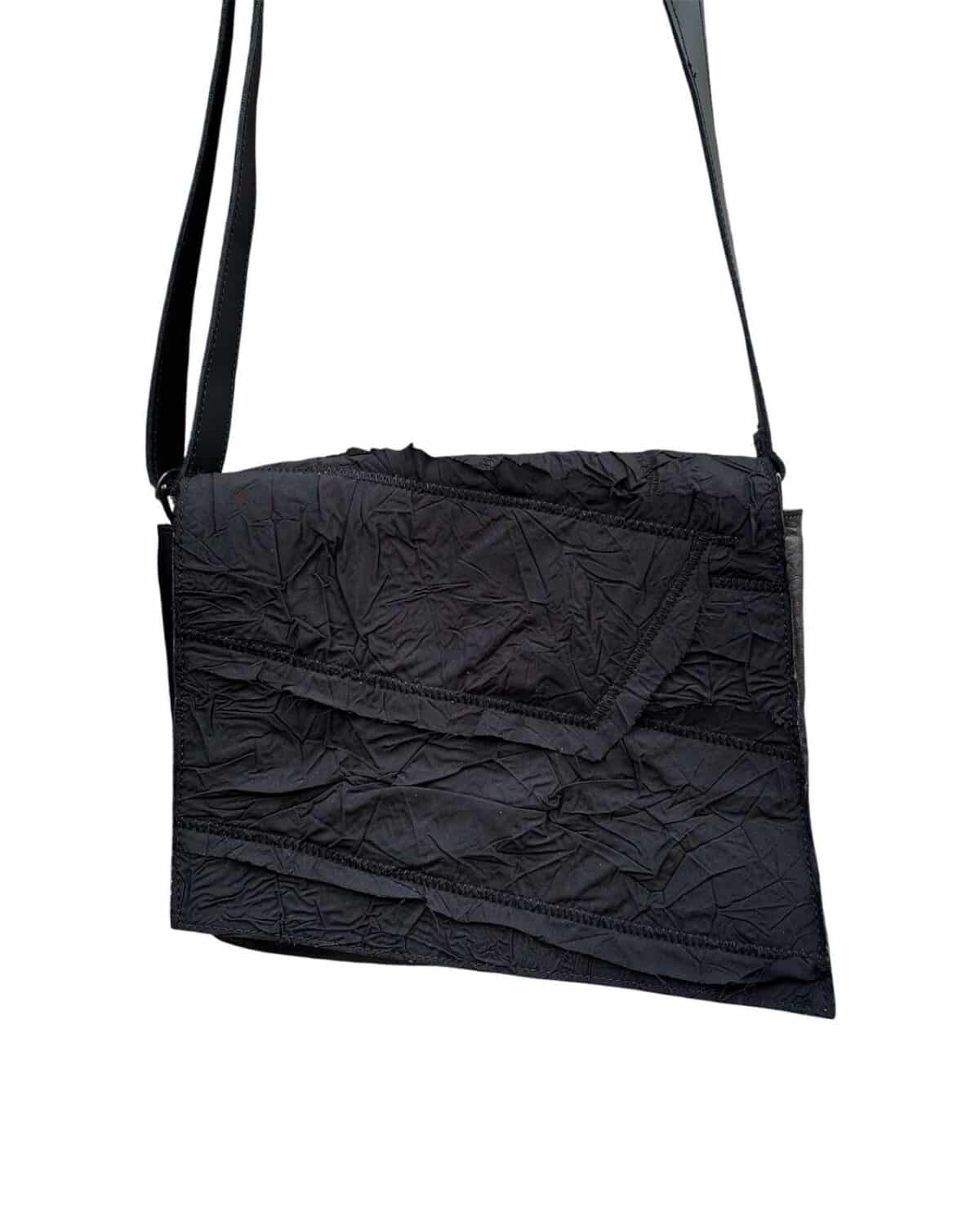 Pochette cuir et tissu